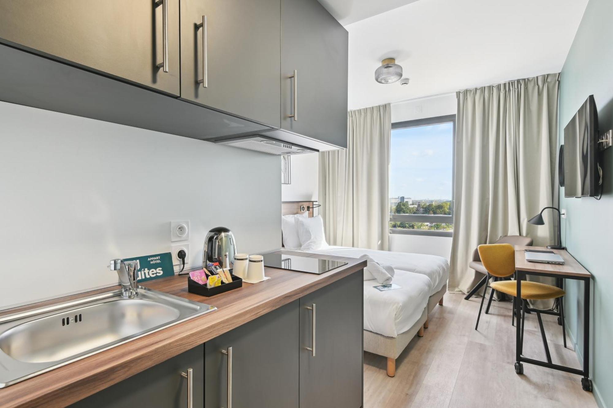All Suites Paris Ouest Colombes Colombes (Hauts-de-Seine) Quarto foto